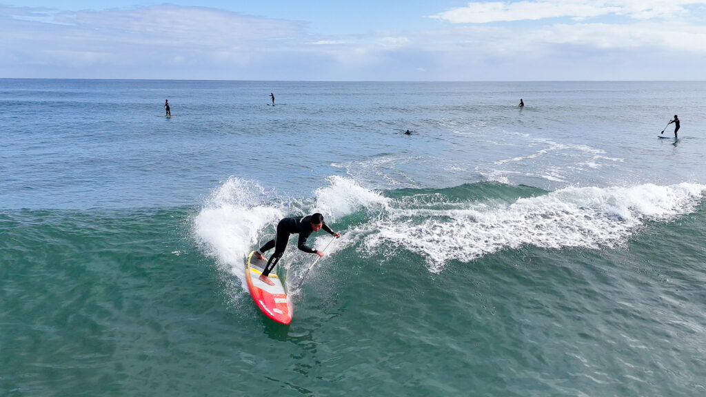 SUP SURFING